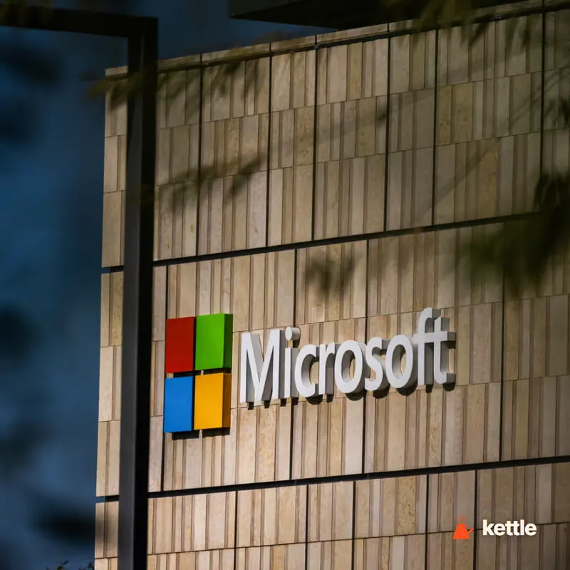 Microsoft logo and wordmark on the exterior wall of a Microsoft building