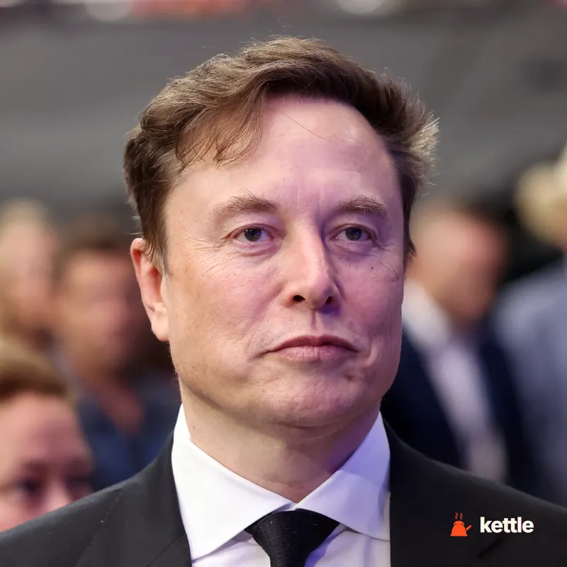 Elon Musk, close-up portrait in a suit at an event